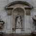 ...la cui linearit romanica  spezzata da un gruppo di statue barocche che rappresentano la Madonna affiancata da due figure dalla lunga barba
